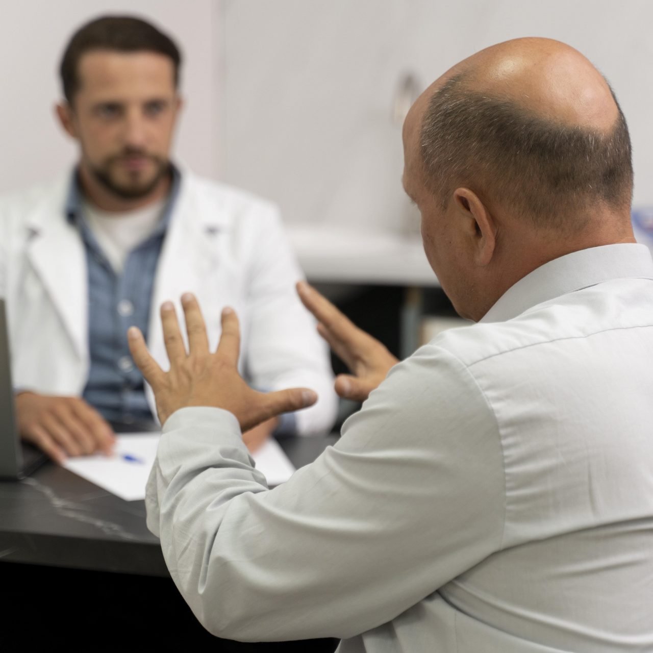 man-going-through-follicular-unit-extraction-process-min